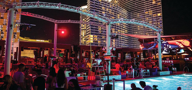 Marquee Nightclub - Las Vegas Rooftop Bar overlooking their pool with Marquee's iconic arches above it