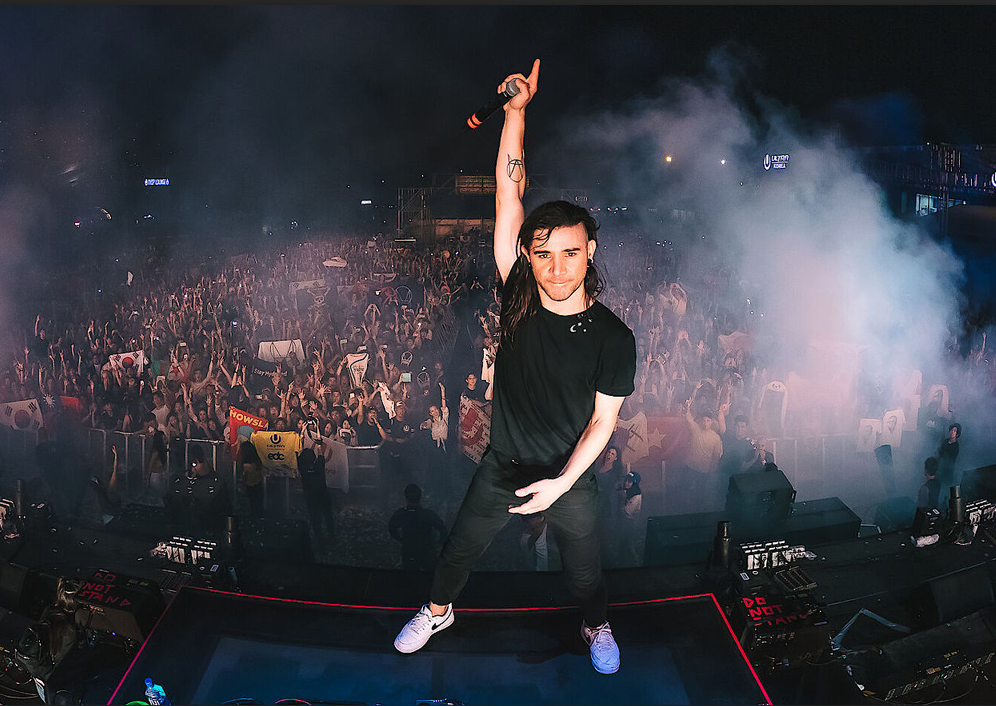 Skrillex performing