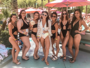 Las Vegas bachelorette party with girls dancing at a pool club