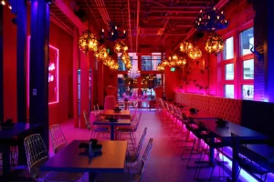 Colorful neon and floral walls at Layer Cake Nashville